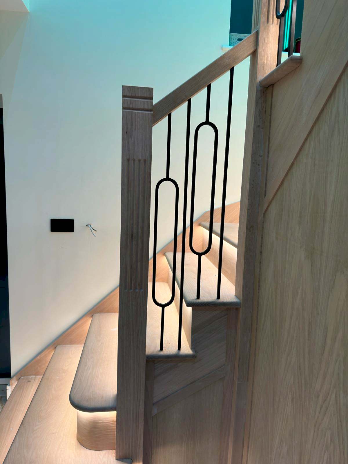 Oak staircase with metal spindles & Led lights